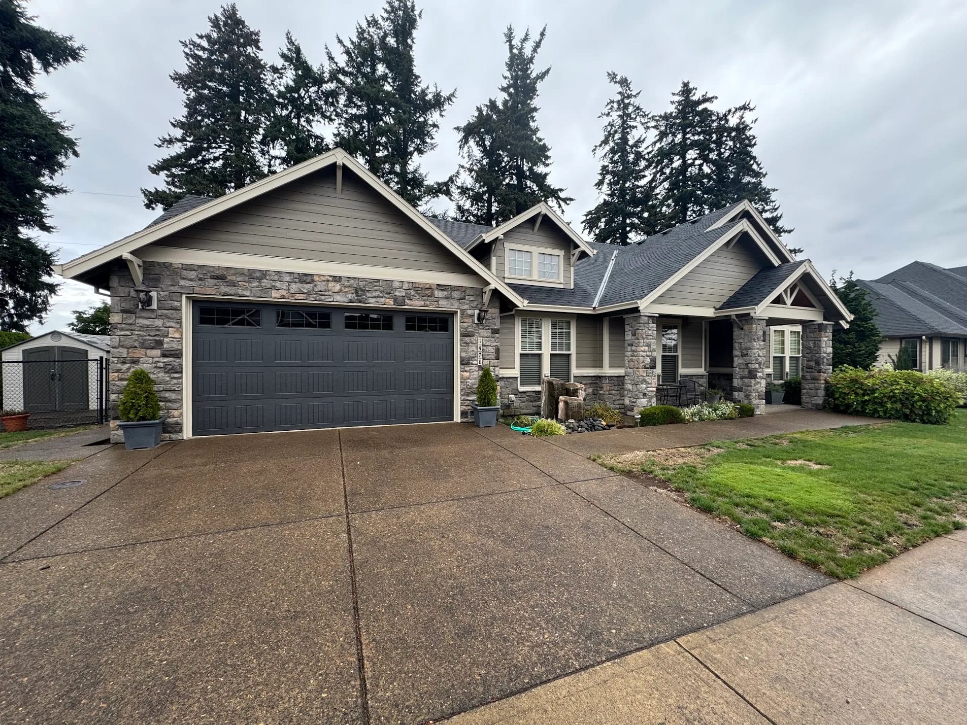 Craftsman exterior repainted in cool gray with crisp trim